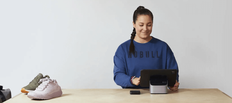 person using Shopify hardware POS terminal