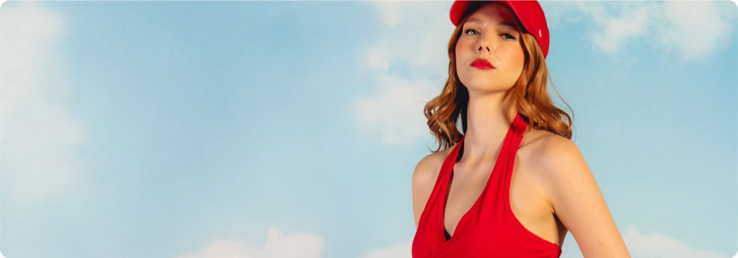 Princess Polly: Woman wearing red Princess Polly top and cap